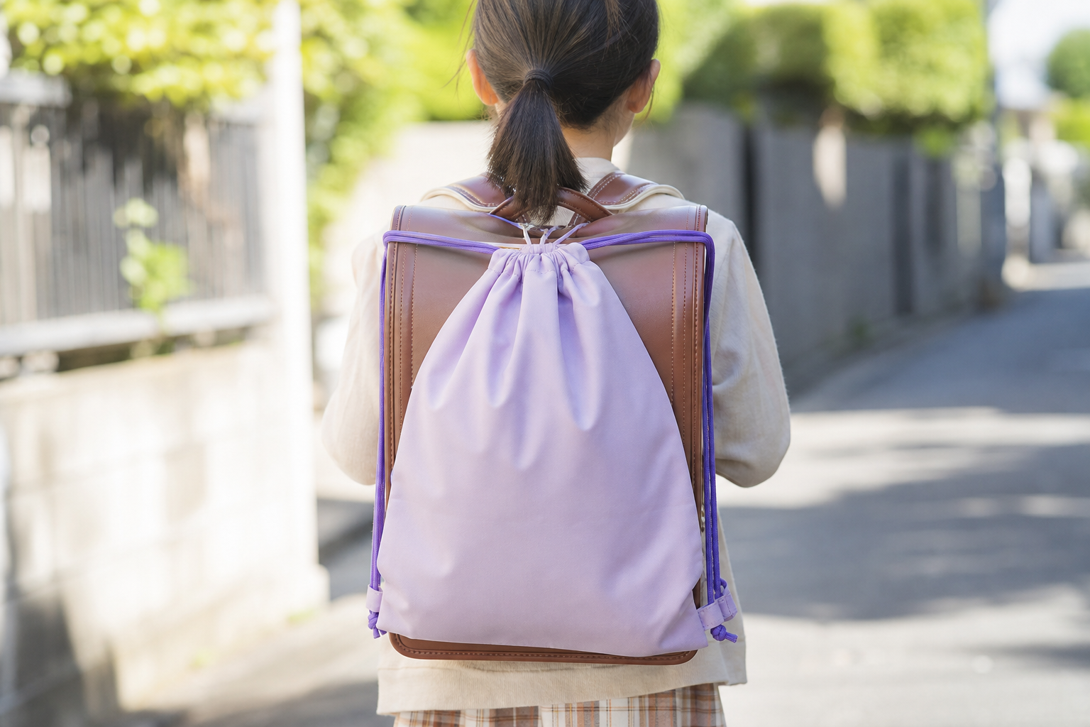 なぜナップサックはランドセルからズレてしまうのか？